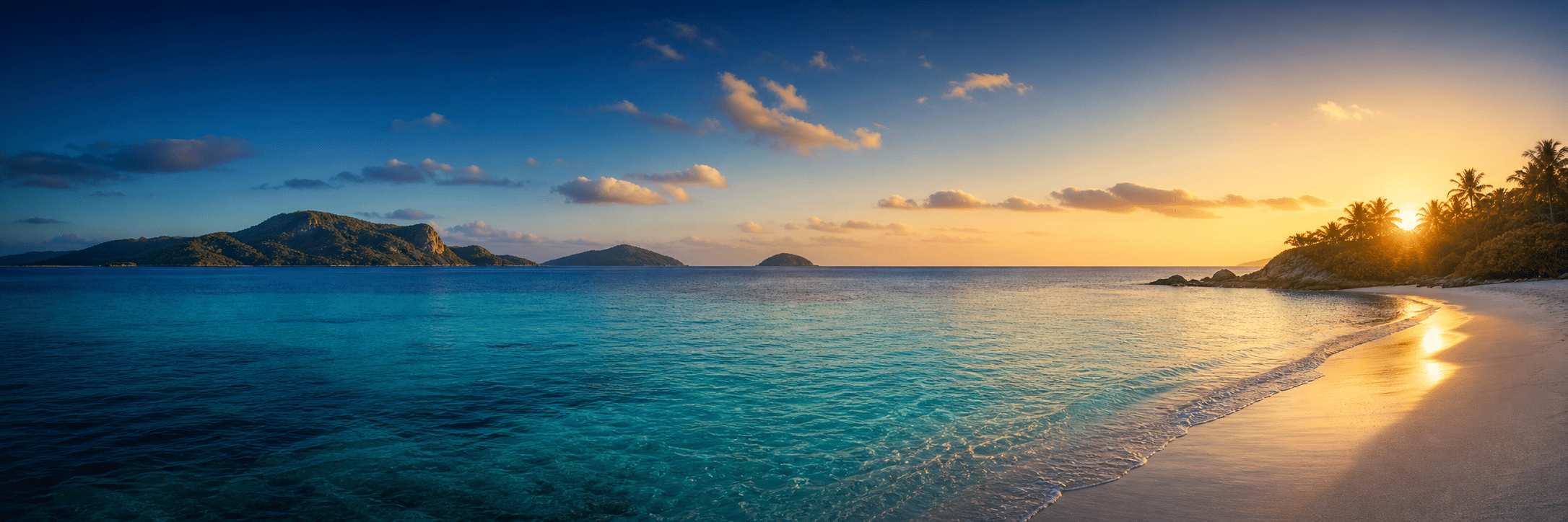 Golden beach and ocean at sunset